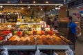 BARCELONA, SPAIN - MAY 16, 2017: Sale of different sweets, nuts, dry fruits and vegetables, oils and other products on the famous