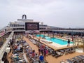 Barcelona, Spain - May 25, 2023: The simming pool area on the cruise ship MSC Grandiosa Royalty Free Stock Photo