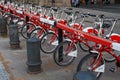 BARCELONA, SPAIN - MAY 15, 2017: The station with red Viu BiCiNg bicycles in Barcelona. Bicing is a bicycle sharing system with