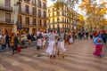 BARCELONA, SPAIN - NOV 30, 2018: La Rambla in Barcelona, Spain. La Rambla is a street in central Barcelona, between El Raval and