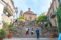 Barcelona, Spain - November 2nd, 2013: Tourists climb steps in charming Barceloneta. Royalty Free Stock Photo