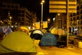 Barcelona, Spain - 5 november 2019: tents occupy plaÃÂ§a universitat in barcelona at night with catalan flags. separatists students