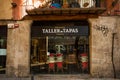 Barcelona, spain - 20 november 2020: window of empty closed bar and tapas restaurant due to corona virus pandemic lock down. covid