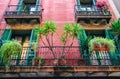 Beautiful spanish house with a balcony and plants. Barcelona city architecture. Authentic Royalty Free Stock Photo