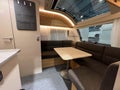 Barcelona, Spain October 11 2023: Camper van interior with dinette and ceiling window Royalty Free Stock Photo