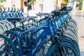 Barcelona, Spain - October 15, 2022 City bikes rent parking in city street