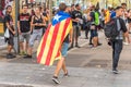 BARCELONA, SPAIN - OCTOBER 3, 2017: Demonstrators bearing catalan flag during protests for independence in Barcelona. Copy space f
