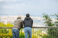 BARCELONA, SPAIN - OCTOBER 15, 2018: People looking at the Barcelona port from Montjuic castle. Harbour with ships in the city.