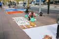 BARCELONA, SPAIN - OCTOBER 15, 2018: People selling illegal things in the Barcelona streets. Forgery on the ground