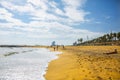 BARCELONA, SPAIN - OCTOBER 15, 2018: People walking on the Barcelona beach. Summer vacations travel. Barceloneta on sunny day. Royalty Free Stock Photo