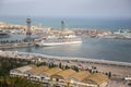 BARCELONA, SPAIN - OCTOBER 15, 2018: View on Barcelona port from Montjuic castle. Harbour with ships in the city. Cruise liner on