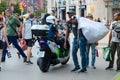 Illegal trade of souvenirs on Plaza Catalunya, Barcelona, Spain. Police officer makes warning to merchant