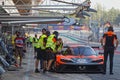 Red KTM X-Bow pit stop during 24h Series