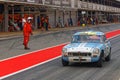 Historic racing car in the pitlane