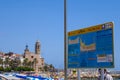 Playa La Ribera Beach sign cartel in Sitges. San BartolomÃÂ© y Santa Tecla church Royalty Free Stock Photo