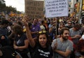 Peacefully protest against the arrests of two Catalan separatist leaders and to demand their liberation