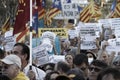 Peacefully protest against the arrests of two Catalan separatist leaders and to demand their liberation