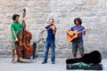 Street trio band playing music Royalty Free Stock Photo