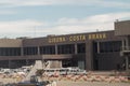 Barcelona, Spain terminal and sign view of Girona Costa Brava airport from inside airplane. Royalty Free Stock Photo