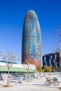 Barcelona Torre Agbar tower in daytime iconic modern designed skyscraper - tall building city scene