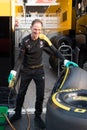 Renault Formula One mechanic washing tyre