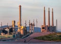 Sunset over the Besos-Chernobyl chimneys in Badalona seen from Barcelona`s Forum Royalty Free Stock Photo