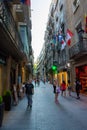 People walking through a Street of Barcelona