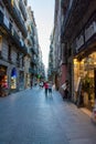 People walking through a Street of Barcelona