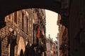 Barcelona, Spain - 26th October 2019: View below the gothic bridge in Gothic Quarter of Barcelona, Carrer del Bisbe