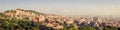 Barcelona sunny skyline seen from Park GÃ¼ell hills. Royalty Free Stock Photo