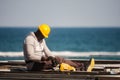 Barceloneta,Barcelona, Spain, March 2016: electrician work on a roof Royalty Free Stock Photo