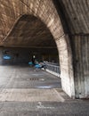 Barclays bicycle under a bridge in London, UK