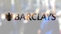 Barclays logo on a glass against blurred crowd on the steet. Editorial 3D rendering