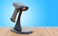 Barcode reader on the wooden table. 3D rendering Royalty Free Stock Photo
