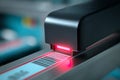 A barcode scanner reads a products barcode at a retail location. The red laser emits light on the label, ensuring quick and Royalty Free Stock Photo
