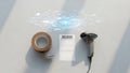 Barcode scanner and tape roll for package labeling with digital network overlay effect Royalty Free Stock Photo