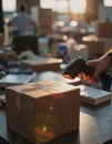 Barcode scanner in use on a production table with packages Royalty Free Stock Photo