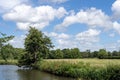 Walking and swimming along the river Ouse in Barcombe on a summers day. Three