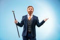 The barded man in a suit holding cane. Royalty Free Stock Photo