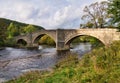 Barden Bridge - a three-arched humpbacked bridge across the River Wharfe in the Yorkshire Dales, England, UK Royalty Free Stock Photo