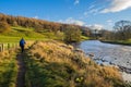 Walking back to Barden Bridge on the River Wharfe in the Yorkshire Dales Royalty Free Stock Photo