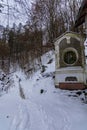 Station of the Cross next to mountain trail in Bardo mountains full of snow at winter