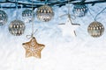 Bare branches with christmas holiday lights and star ginger cook Royalty Free Stock Photo