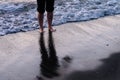 Bare Feet Awash in the Sand and Surf.