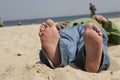 Bare feet on the beach Royalty Free Stock Photo