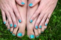 Bare feet and hands with manicure pedicure Royalty Free Stock Photo