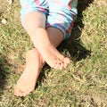 Bare feet of a little girl