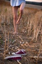 Bare feet, sneakers and girl