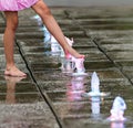 Bare feets in the fountain