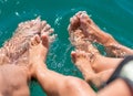 Bare feets in the water of the sea boy, mother, father. Positive human emotions, feelings,